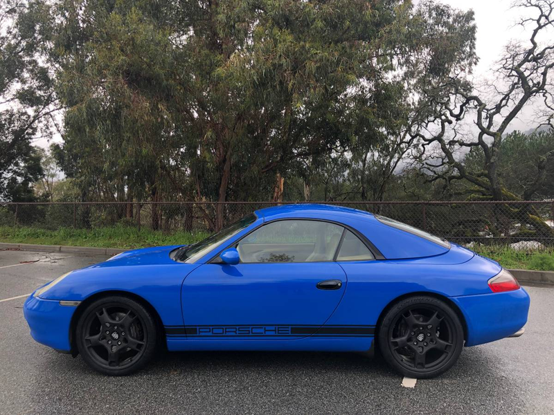 Illustration for article titled At $16,999, Could This 1999 Porsche 911 Cabriolet Have You Saying “It’s a Wrap?”